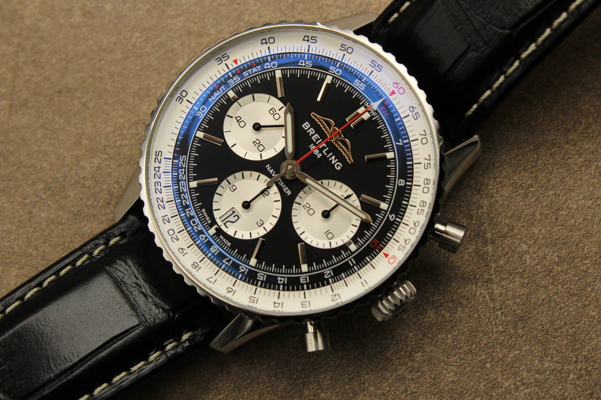 The Breitling Navitimer AB0138 represents watchmaking excellence with its B01 manufacture movement. This automatic chronograph ensures precision and durability. Its iconic aviation-inspired design features a slide rule bezel. Stainless steel case, exceptional condition. Sold complete with box, papers, and valid warranty.