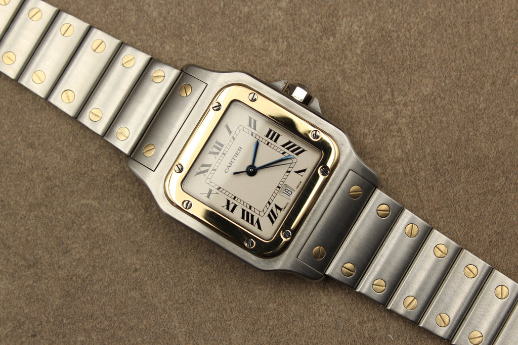 Montre Cartier Santos Galbée pour homme en acier et or, vendue par prestigeandtime.com, présentée en occasion authentique en excellent état avec full set, modèle emblématique idéal pour collection ou investissement horloger.