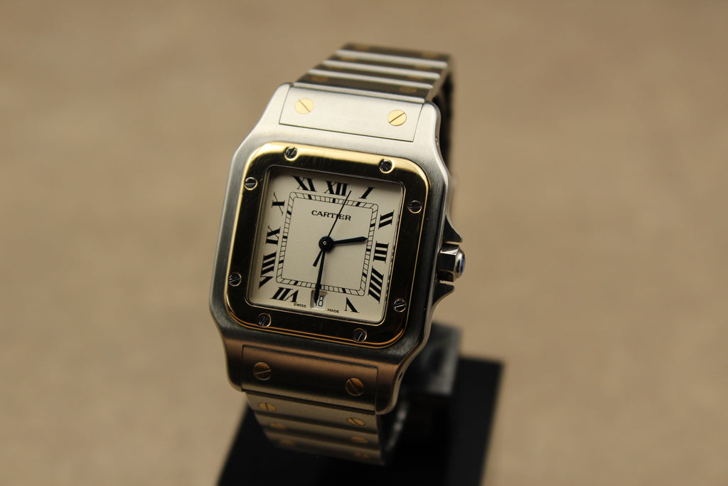 Montre Cartier Santos Galbée pour homme en acier et or, vendue par prestigeandtime.com, présentée en occasion authentique en excellent état avec full set, modèle emblématique idéal pour collection ou investissement horloger.